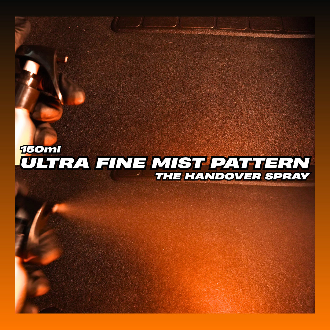 Overtake Handover Spray 150ml ultra fine mist pattern demonstrated on car carpet — The Handover Spray by Overtake Scents