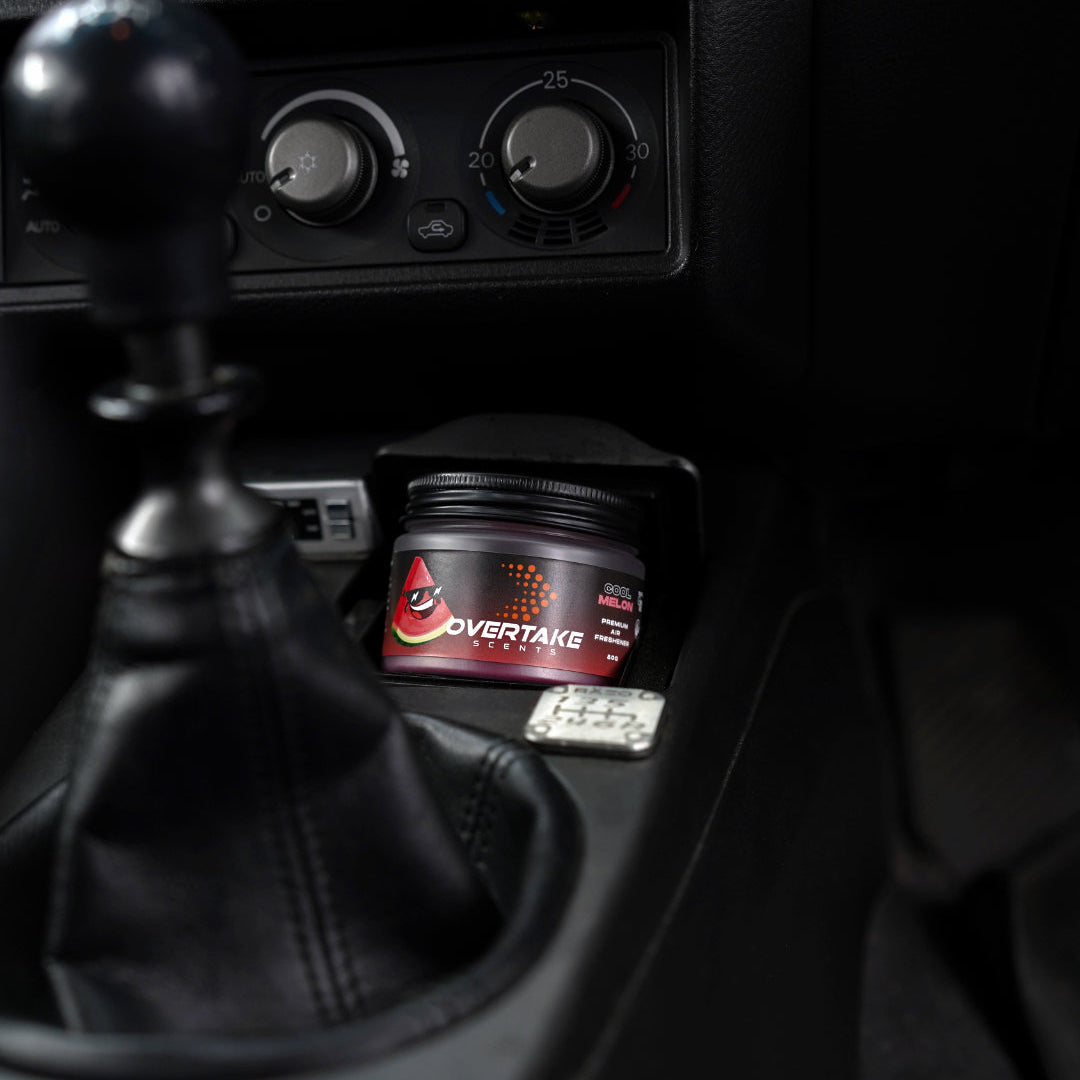 Cool Melon gel car air freshener next to manual shifter in Mitsubishi Lancer Evolution — Overtake Scents