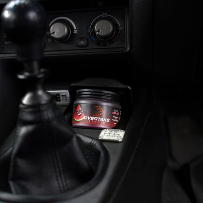 Cool Melon gel car air freshener next to manual shifter in Mitsubishi Lancer Evolution — Overtake Scents