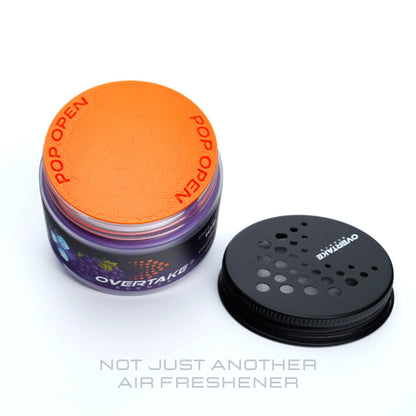 Grape Ice gel car air freshener with lid removed, freshness seal intact — Overtake Scents