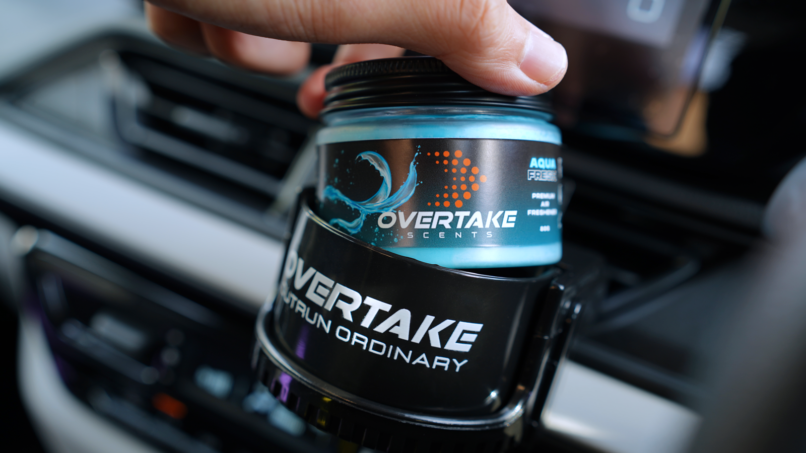 Overtake vent mount holding Aqua Fresh gel car air freshener clipped into car vent — Overtake Scents