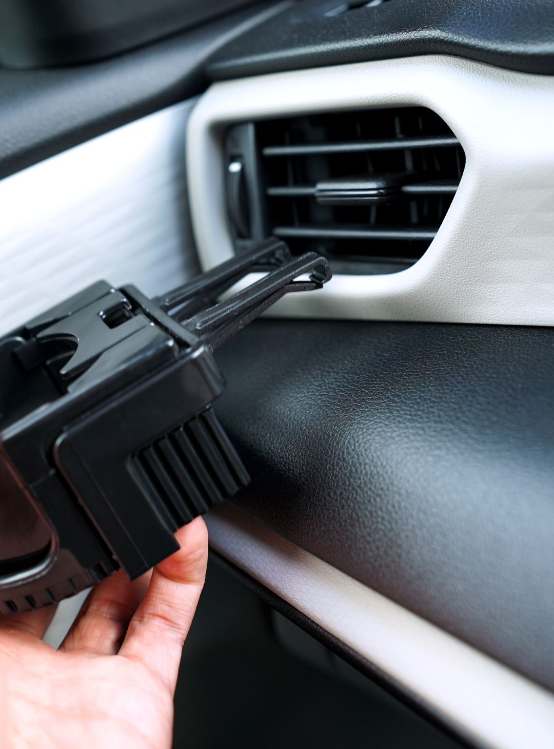 Overtake vent mount car air freshener holder held in hand, alternate view — Overtake Scents Melbourne