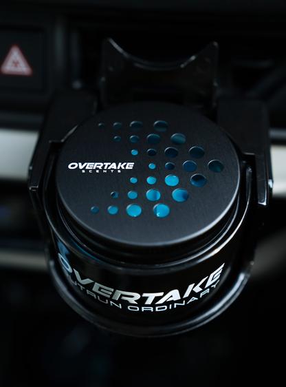 Overtake vent mount top-down view holding Aqua Fresh gel car air freshener in vent — Overtake Scents